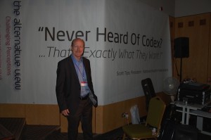 The NHF UK - AV5 - President of The NHF Scott Tips in Front of the "Ever Heard Of Codex? That's Exactly What They Want!" Sign